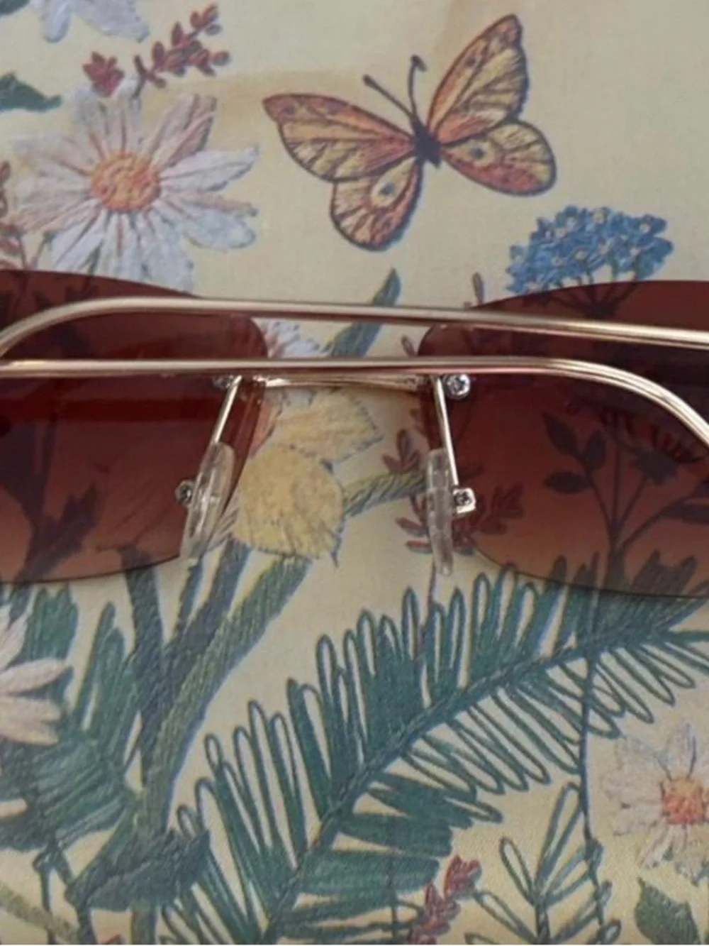 Y2K Rimless Brown Tint Sunglasses Gold Metal Rectangle Shades with gold temples